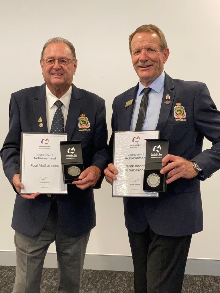 John Rolfe and Paul McGuinness wearing the jackets whilst at a RSL Function